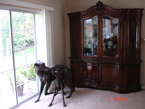 Breakfront And Bronze Dogs